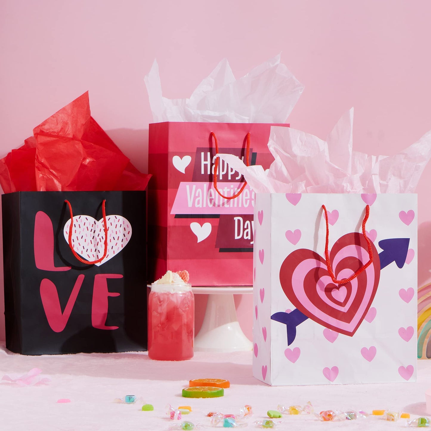 8 Pcs Valentines Day Gift Bags with Filling Paper in 4 Designs for Kids Party Favor Supplies Paper Wrapping Kraft Bags with Colorful Heart shaped Design