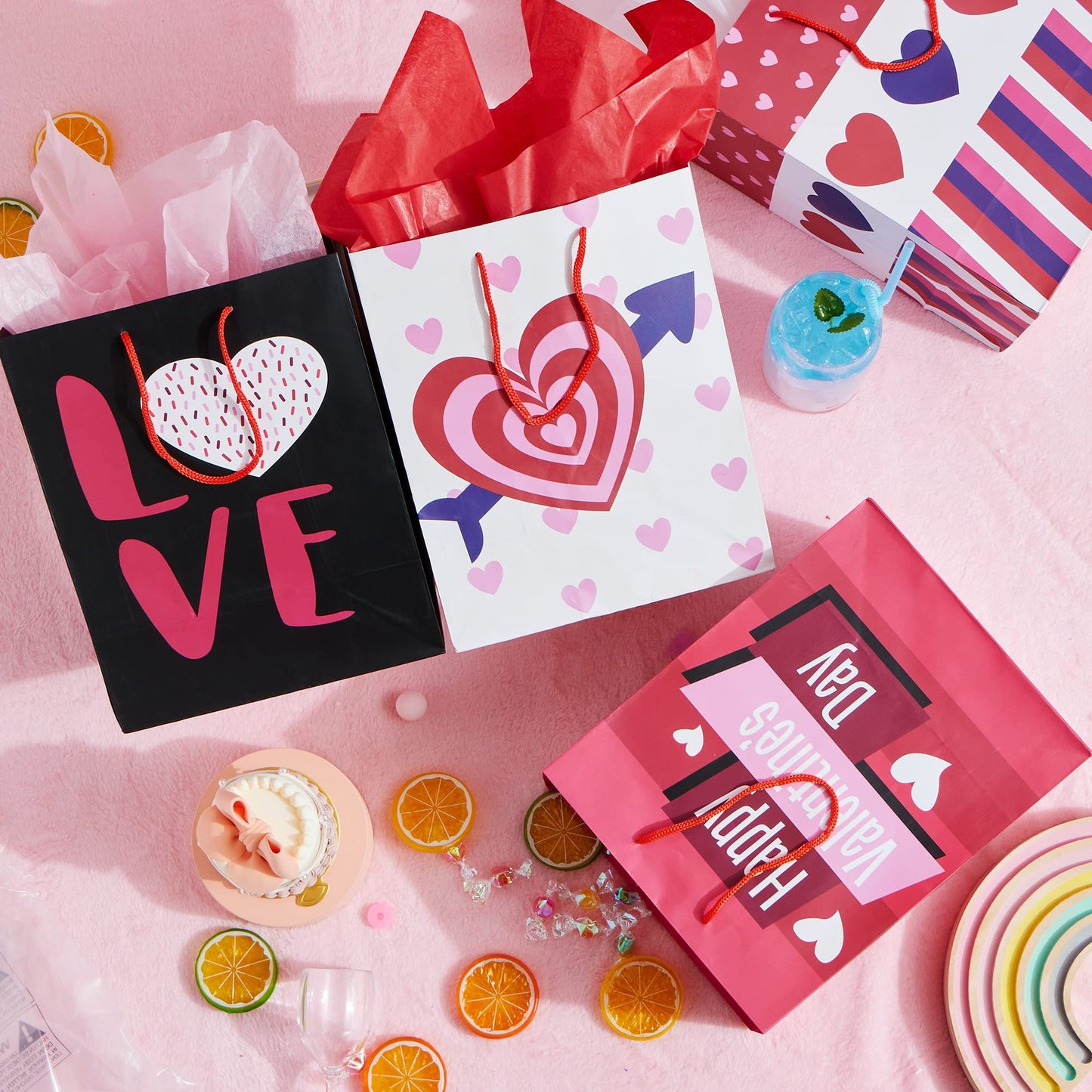 8 Pcs Valentines Day Gift Bags with Filling Paper in 4 Designs for Kids Party Favor Supplies Paper Wrapping Kraft Bags with Colorful Heart shaped Design