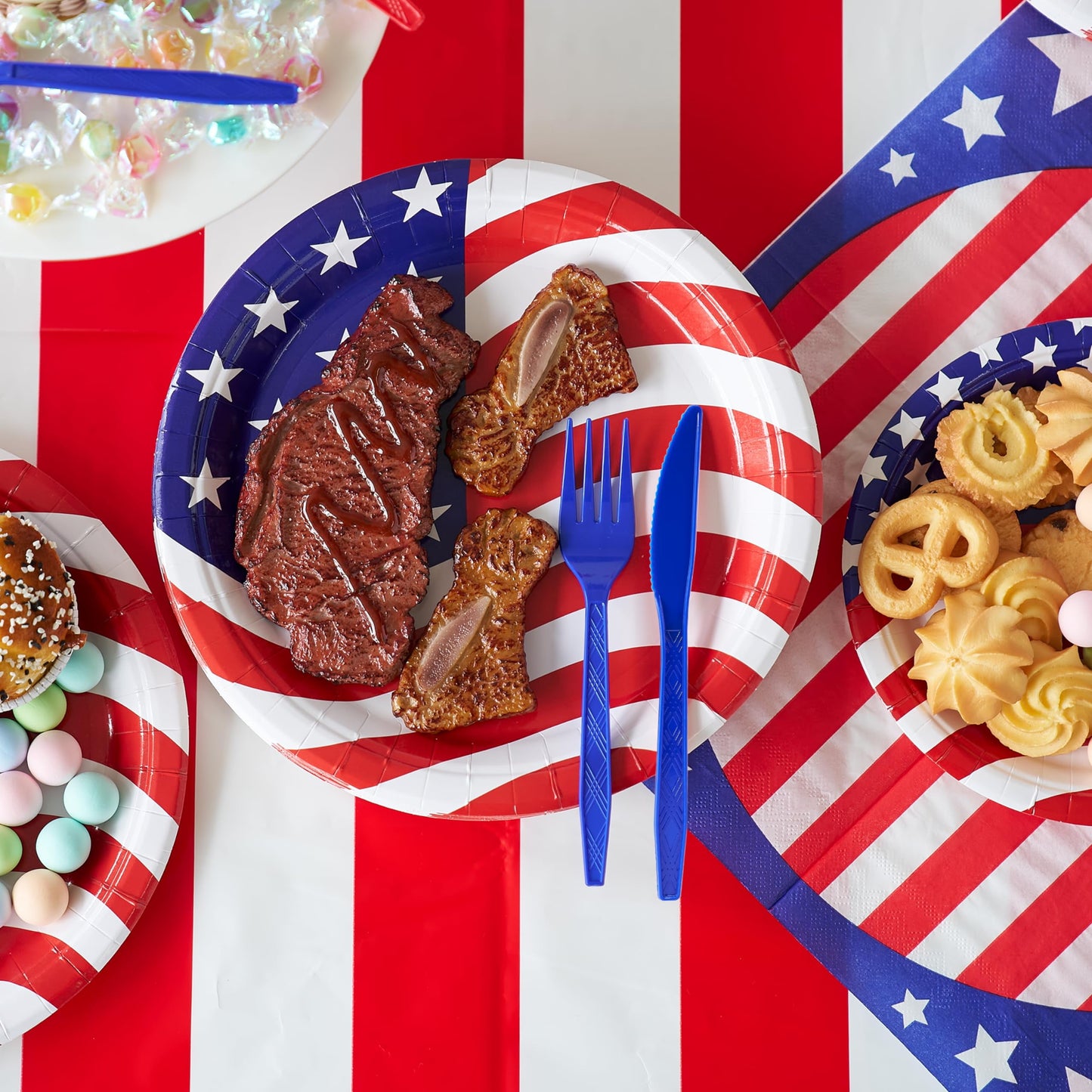 180 pieces of patriotic party utensils, 30 plates, 30 napkins, 30 paper cups, and 90 plastic containers for the July 4th celebration