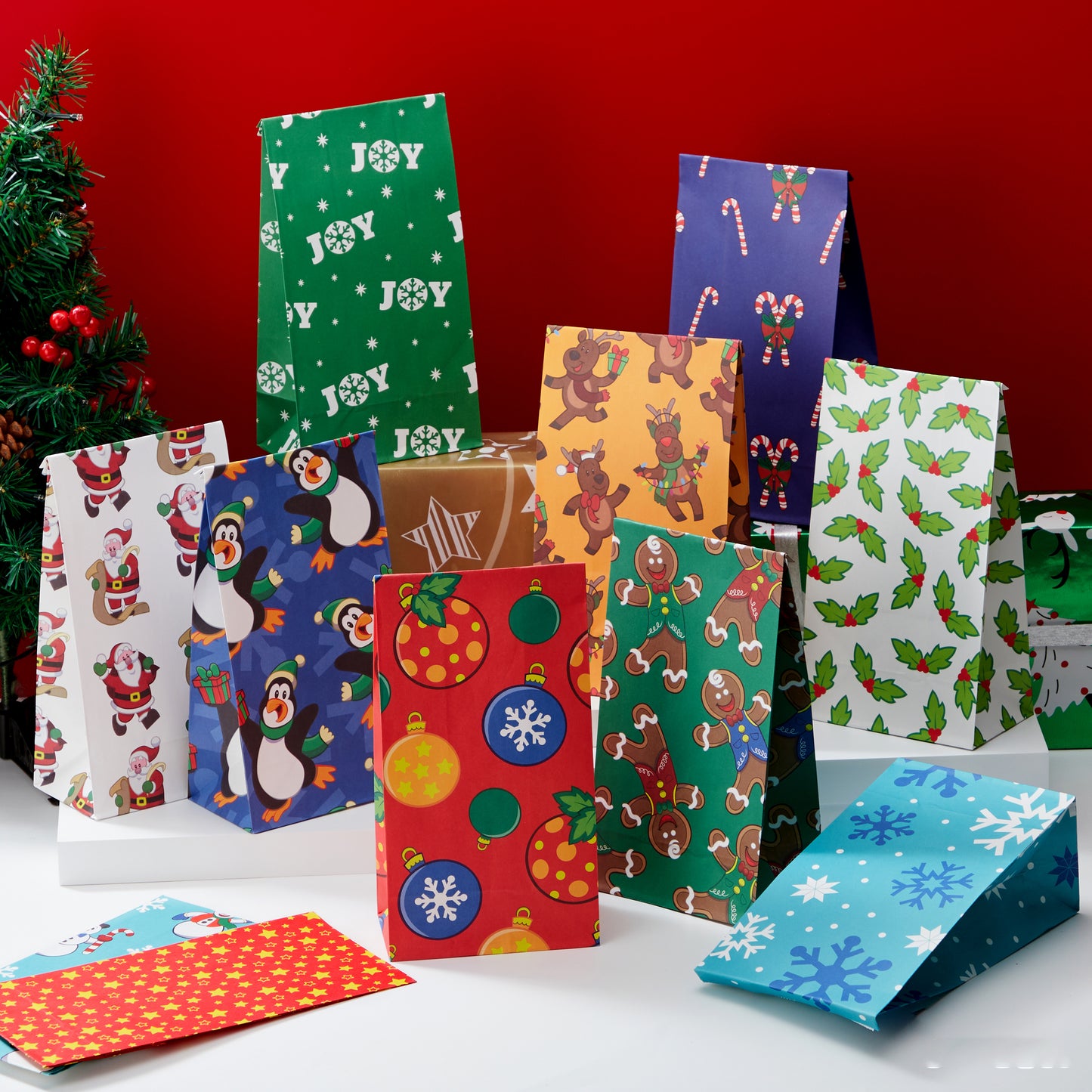 Joyfy 72 Pcs Christmas Holiday Gift Bags, 12 Assorted Christmas Designs Goodie Bags for Classrooms, Party Favors, Small Gift Bags, Kraft Bags and Christmas Craft Bags