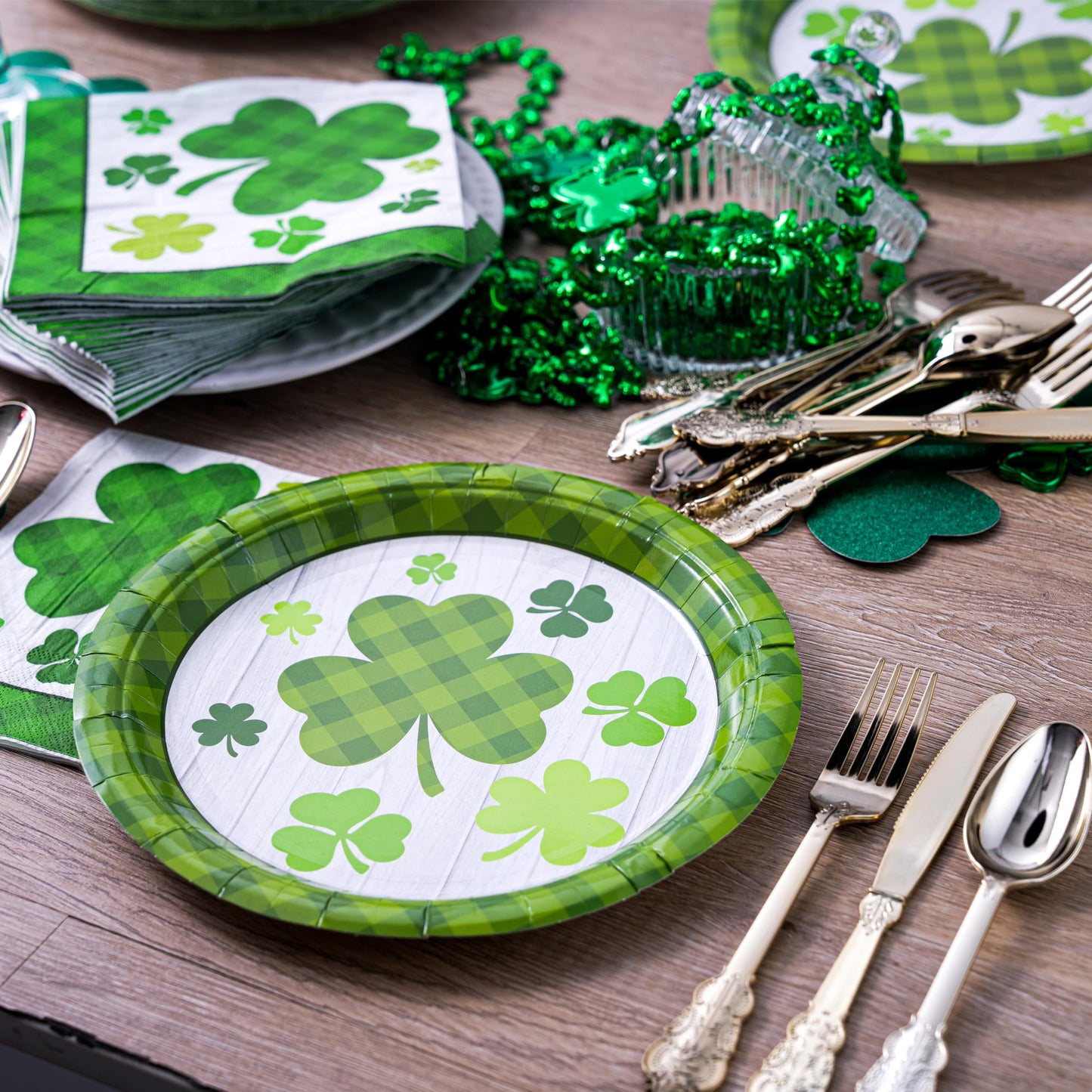 A set of 100 St. Patrick's Day plates and napkins, accommodating 50 pieces. 50 green clover checkered plates and 50 green clover checkered paper napkins, designed with clover